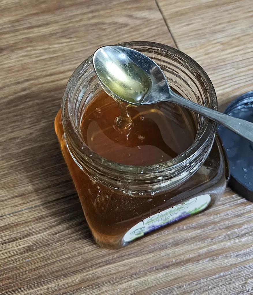 عسل طبیعی چهل گیاه رویال کندو کوهرنگ - 450 گرم به همراه عسل طبیعی گون گز رویال کندو کوهرنگ - 450 گرم