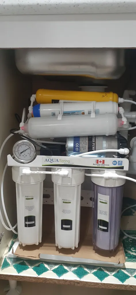 دستگاه تصفیه کننده آب آکوآ اسپرینگ مدل NF3900 به همراه فیلتر مدل 01 مجموعه 4 عددی