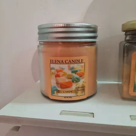 شمع لیوانی النا مدل آب نبات ترش کد 120g