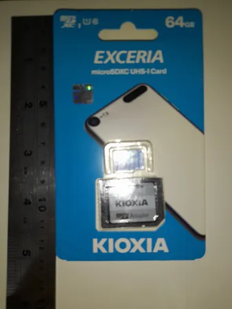 کارت حافظه‌ microSDHC کیوکسیا مدل EXCERIA کلاس 10 استاندارد UHS-I U1 سرعت 100MBps ظرفیت 64 گیگابایت به همراه آداپتور SD