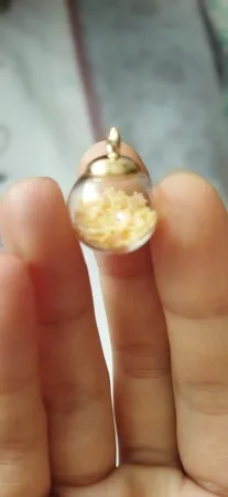 آویز گردنبند دخترانه مدل گوی شیشه ای پر ستاره کد AG 574