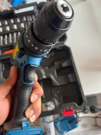 دریل پیچ گوشتی شارژی چکشی جاب مدل JB-5690 B مجموعه 45 عددی