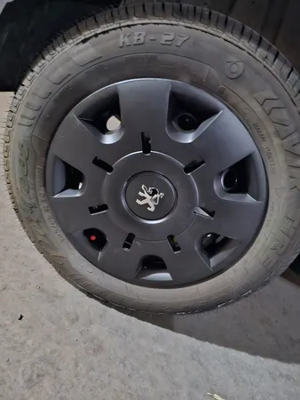 قالپاق چرخ تی پی ای مدل ِP207-B04 سایز 14 اینچ مناسب برای پژو 207 بسته 4 عددی