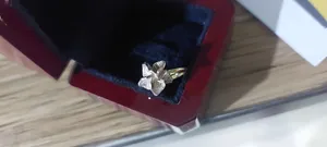 تجریه خرید انگشتر طلا 18 عیار زنانه قیراط طرح گل کد GH2632