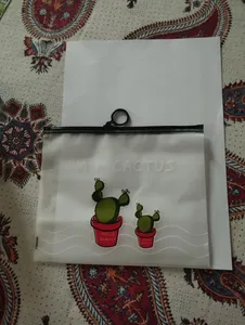 تجریه خرید پوشه زیپ دار مدل کاکتوس و گل