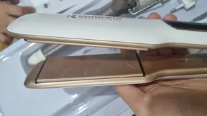 تجریه خرید اتو مو کنورث مدل kw313 به همراه فر کننده مو