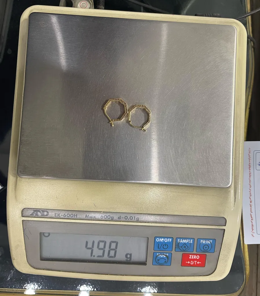 گوشواره طلا کم اجرت 18 عیار زنانه گلدم مدل E-2311008