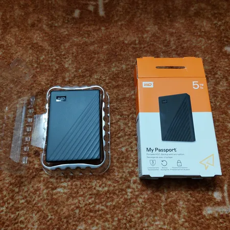 هارد اکسترنال وسترن دیجیتال مدل My Passport ظرفیت پنج ترابایت دارای رابط USB Type-A 3.2