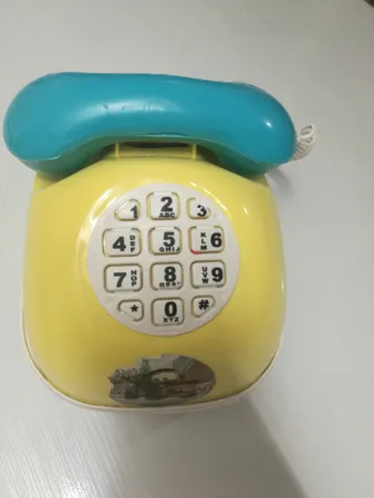 قلک طرح اسباب بازی تلفن و ماشین