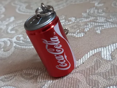 فلش مموری طرح کوکاکولا مدل UM-024 ظرفیت 32 گیگابایت