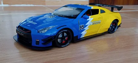 ماشین بازی چه ژی مدل نیسان طرح GTR موزیکال دودزا کد CZ128ADT