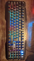 کیبورد گیمینگ تسکو مدل TK 8021L با حروف فارسی، سوییچ ممبران، Full-Size، نورپردازی RGB LED