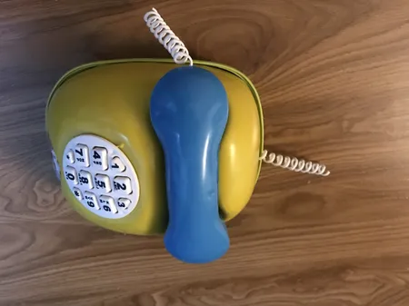 قلک طرح اسباب بازی تلفن و ماشین