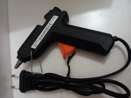 دستگاه چسب تفنگی جانسون مدل FL-138B به همراه یک عدد چسب حرارتی جانسون بصورت رایگان