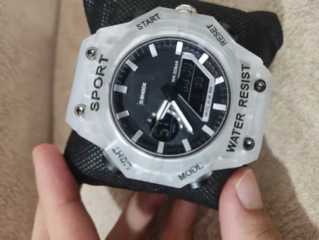 ساعت مچی عقربه ای مدل دو زمانه پمپی قاب شفاف کد w-m