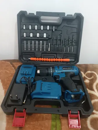 دریل پیچ گوشتی شارژی رویال مکس مدل چکشی مجموعه 29 عددی