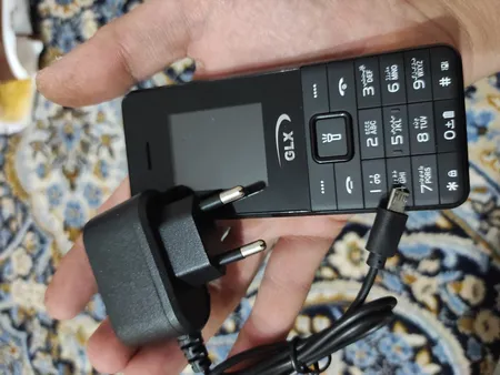 گوشی موبایل جی ال ایکس مدل iT5606 دو سیم کارت ظرفیت 32 مگابایت و رم 32 مگابایت