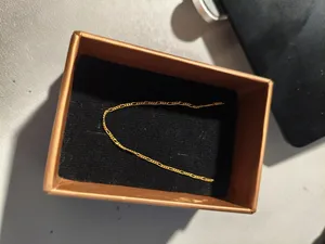 تجریه خرید زنجیر طلا کم اجرت 18 عیار ناریا مدل سوپر فیگارو لوکس