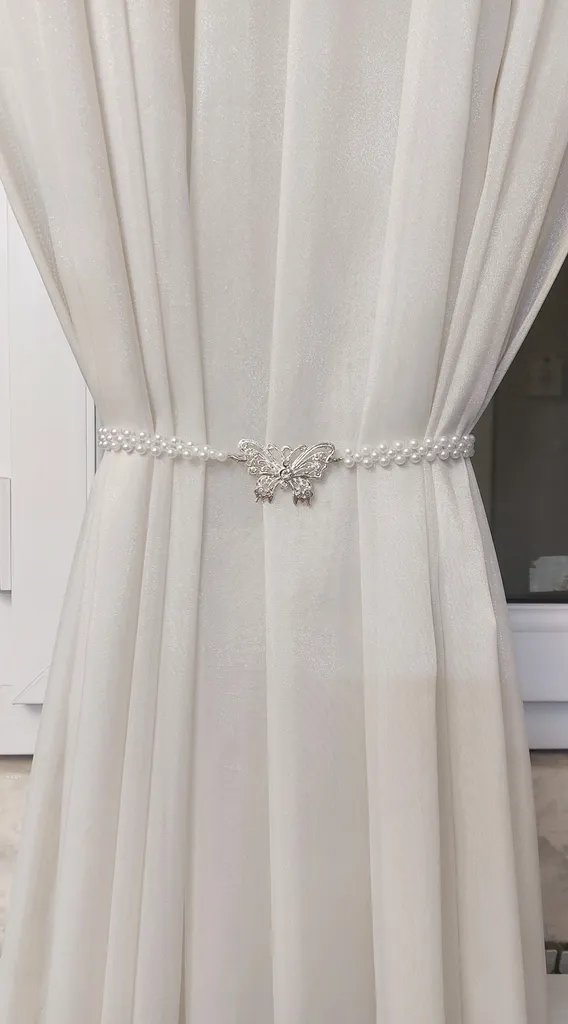 پرده جمع کن مدل پروانه