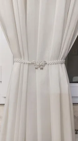 پرده جمع کن مدل پروانه