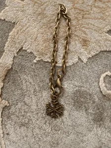 تجریه خرید آویز ساعت زنانه طرح دانه برف