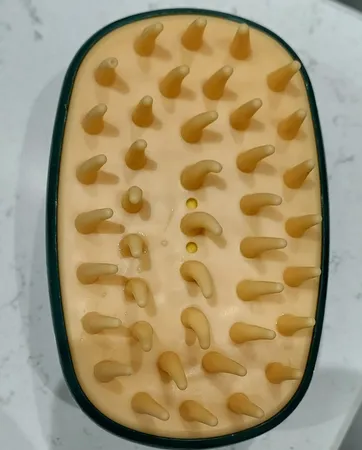 ماساژور سر هیواکس مدل سیلیکونی