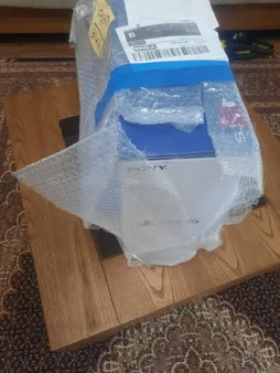 کنسول بازی سونی مدل PlayStation 5 ظرفیت 825 گیگابایت ریجن 1200 آسیا به همراه دسته اضافی و پایه شارژر و بازی FIFA 23