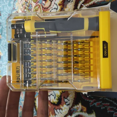 پیچ گوشتی دلی مدل DL1033D مجموعه 33 عددی