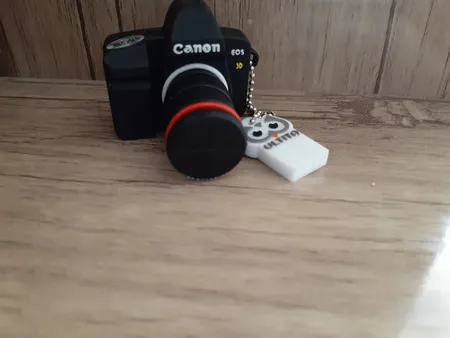 فلش مموری طرح دوربین عکاسی کانن مدل Ultita -CC01 ظرفیت 16 گیگابایت