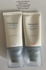 تجریه خرید کرم ضد آفتاب بدون رنگ سنتلا، 50 SPF، مدل 1004، مناسب پوست حساس، نرمال و خشک و حجم 50 میلی‌لیتر، محافظت کننده در برابر اشعه UVA و UVB، بدون تست حیوانی، ++++PA، آبرسان، ضد التهاب، با ماندگاری 3 ساعته