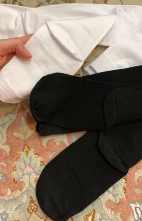 جوراب زنانه تن پوش هنگامه مدل بالا زانو ساده مجموعه 2 عددی