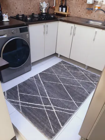 فرش ماشینی ساوین کد 4083 زمینه طوسی