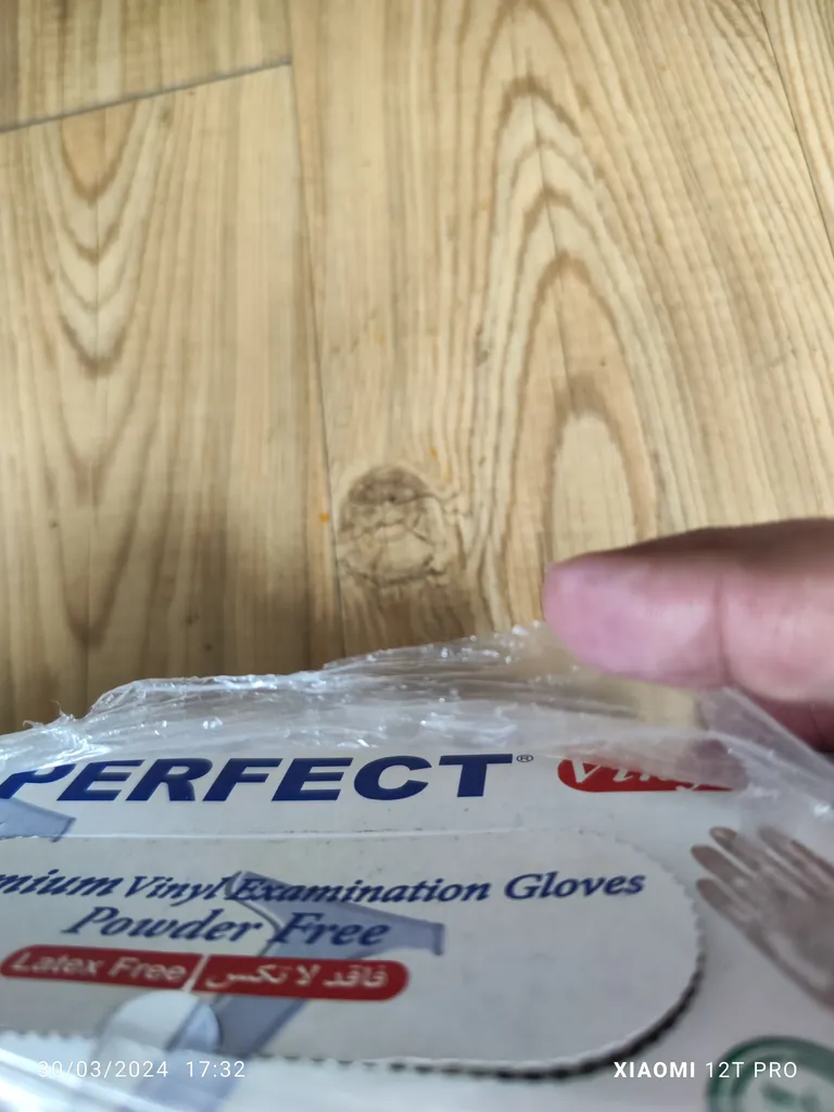 دستکش وینیل او پی پرفکت مدل AM-L سایز لارج بسته 100 عددی