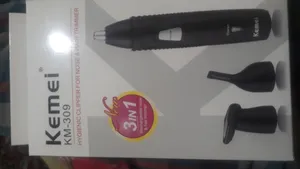 تجریه خرید موزن گوش، بینی و ابرو کیمی مدل KM-309