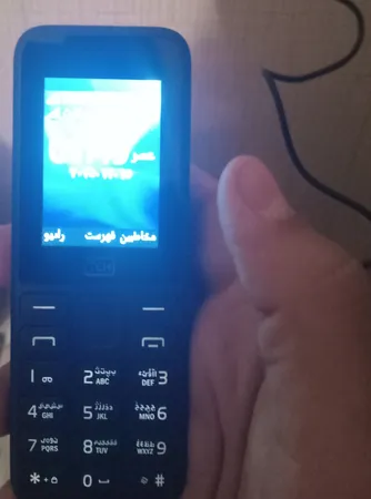 گوشی موبایل تی سی اچ مدل ARC دو سیم‌کارت ظرفیت 4 مگابایت