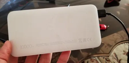 پاوربانک 10 وات شیائومی مدل Redmi ظرفیت 10000 میلی آمپر ساعت به همراه کابل تبدیل microUSB