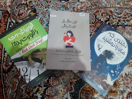 کتاب دختری که ماه را نوشید اثر کلی بارن هیل مترجم مرتضی تبار انتشارات آیین محمود