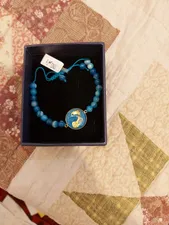 تجریه خرید دستبند زنانه دانژه طرح ماه بهمن کد ZDNG26G6011