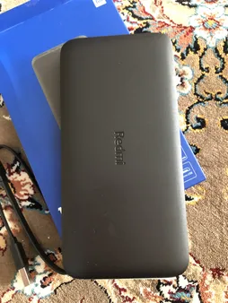 پاوربانک 10 وات شیائومی مدل Redmi ظرفیت 10000 میلی آمپر ساعت به همراه کابل تبدیل microUSB