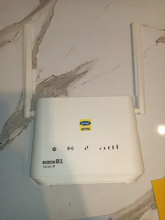مودم 4G LTE ایرانسل مدل i40 B1 به همراه سیم کارت  و 30 گیگا بایت اینترنت  یک ماهه