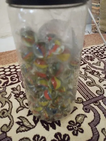 تیله شیشه ای مداد چوبی مدل چند پر بسته 100 عددی