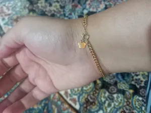 تجریه خرید دستبند زنجیری طلا 18 عیار زنانه الی گالری مدل کارتیه 80