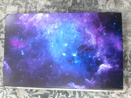 استیکر لپ تاپ راتیانا مدل space15 مناسب برای لپ تاپ 15 تا 17 اینچ به همراه برچسب حروف فارسی کیبورد