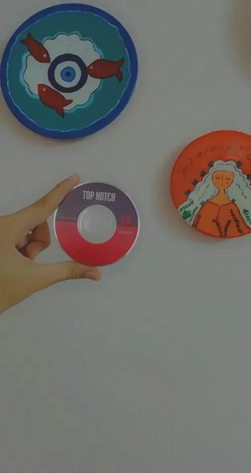 کتاب زبان تاپ ناچ 1B اثر Joan Saslow به همراه لوح فشرده