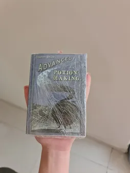 اسباب بازی زینتی مستر گرین مدل کتاب های مدرسه هری پاتر طرح معجون سازی شاهزاده دورگه