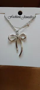 تجریه خرید گردنبند دخترانه دلنار گالری مدل پاپیون