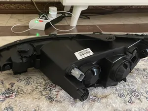 تجریه خرید چراغ جلو گروه پژوهش صنعت مدرن کد 0a65 مناسب برای پژو 206 بسته دو عددی