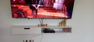 تجریه خرید میز تلویزیون دیواری مدل DLF86L