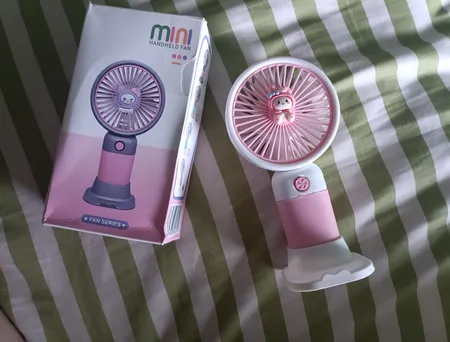 پنکه رومیزی مدل HANDHELD MINI ظرفیت 250 میلی آمپر ساعت