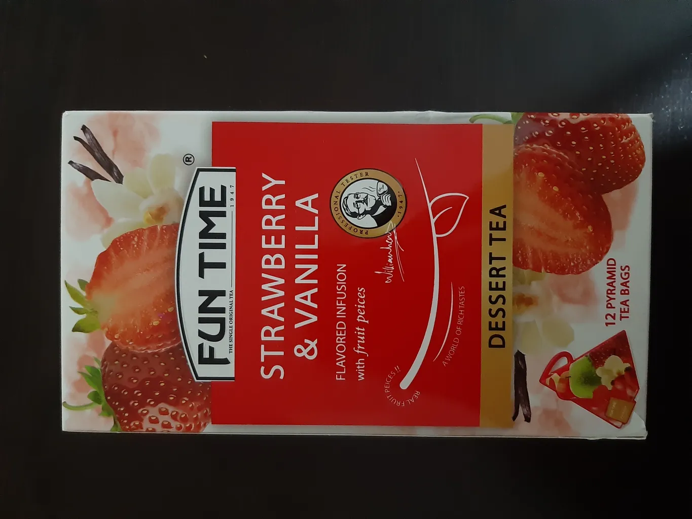 دمنوش دسر طعم دار با تکه های میوه توت فرنگی و وانیل فان تایم بسته 12 عددی